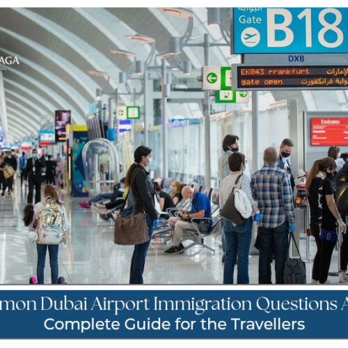 Dubai Airport immigration officer checking a traveller's passport and visa while asking routine entry questions at the immigration counter.