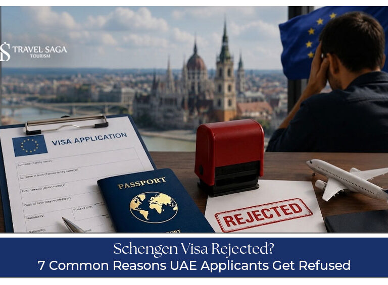 UAE resident reviewing a Schengen visa rejection letter with passport and application documents