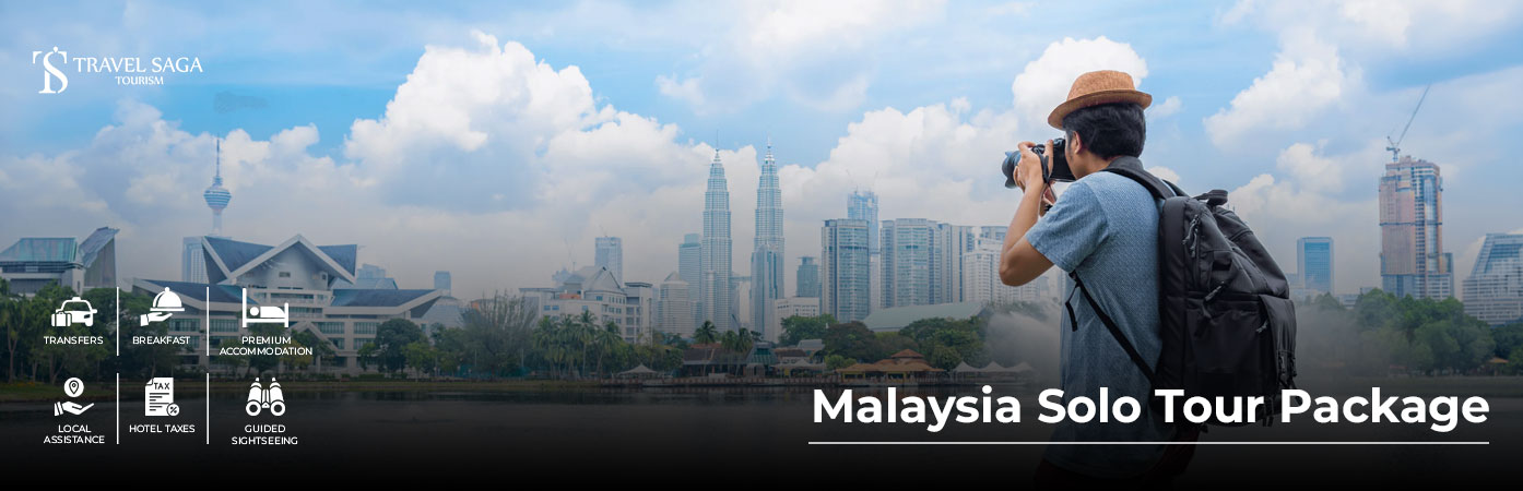 Malaysia solo traveler exploring the Petronas Twin Towers and vibrant streets of Kuala Lumpur during a guided solo tour package.
