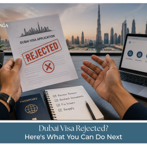 Traveler reviewing a rejected Dubai visa application with passport and documents.