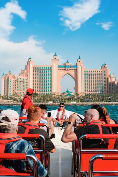 Boat Tours Dubai with Guide Leading a Scenic Waterway Trip