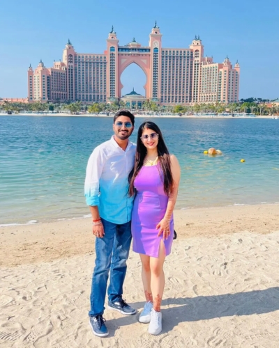 Indian couple enjoying a Dubai honeymoon with Atlantis The Palm in the background