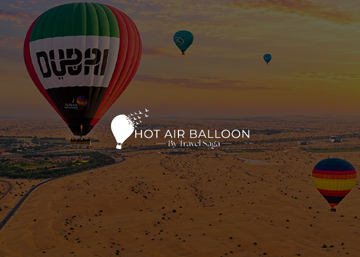 Hot air balloon floating above the Dubai desert during a sunrise flight