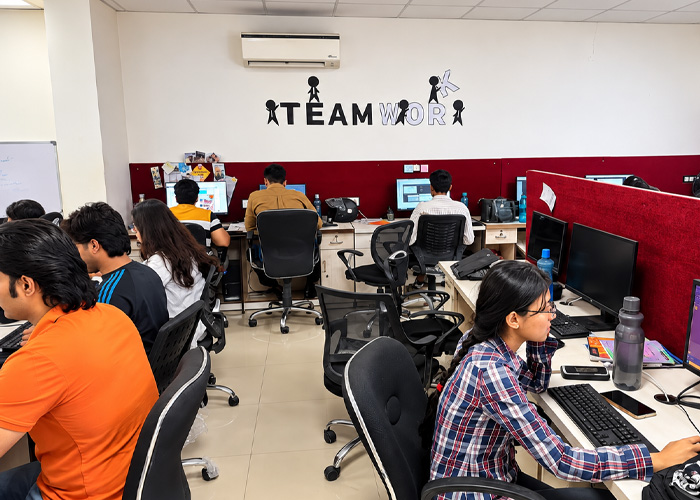 Travel Saga team working together in the Jaipur office